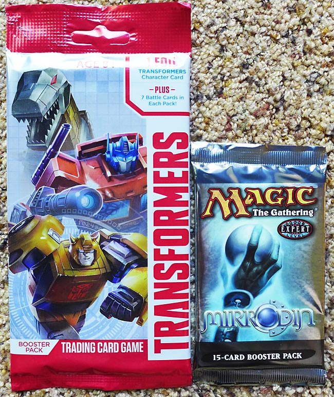 Transformers vs Magic: the Gathering Booster Pack Sizes