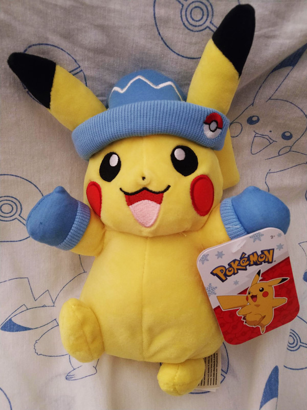 Pikachu with a winter hat and gloves 